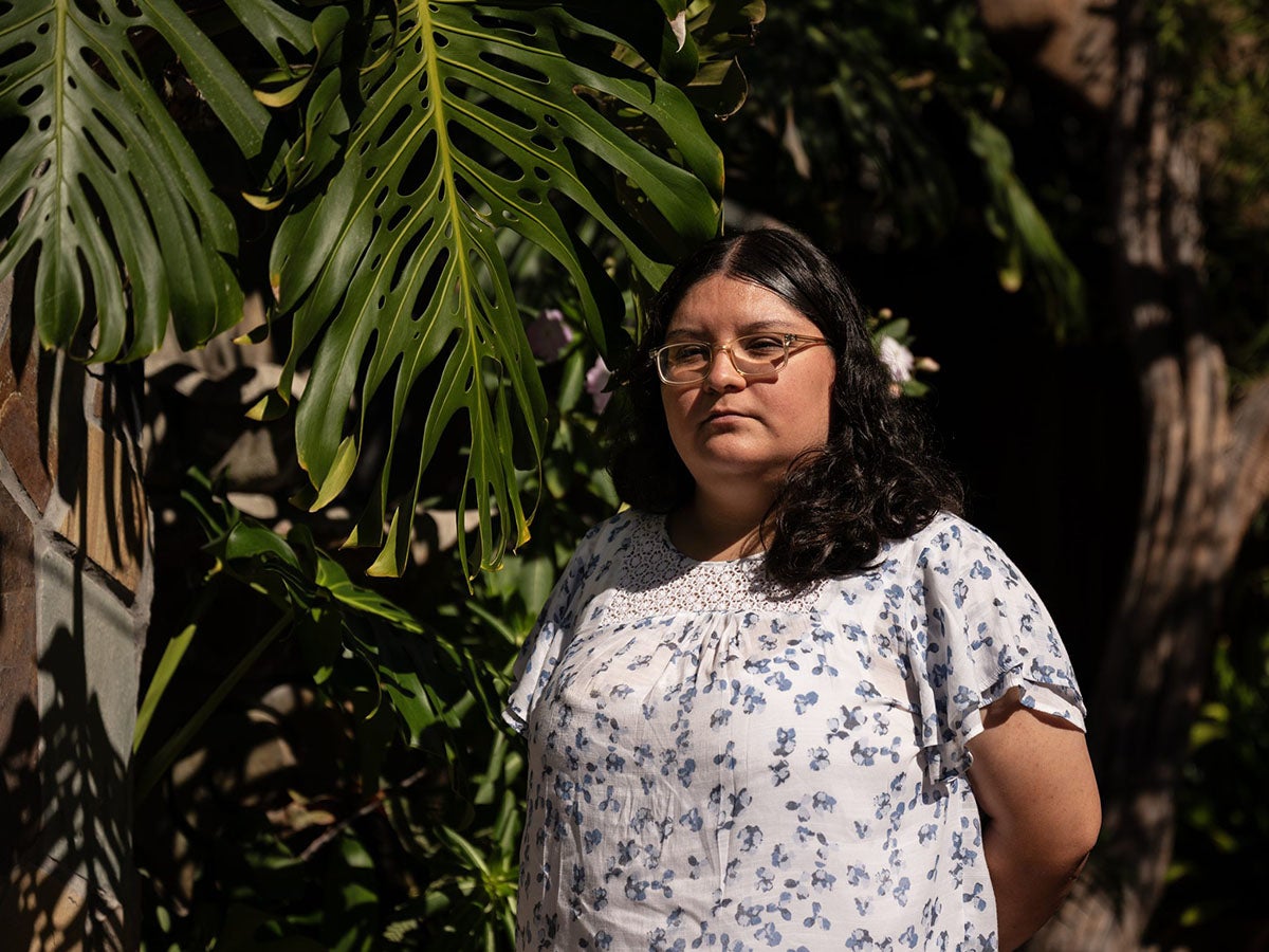 chilling effect on Medi-Cal enrollment; a woman in front of a palm tree