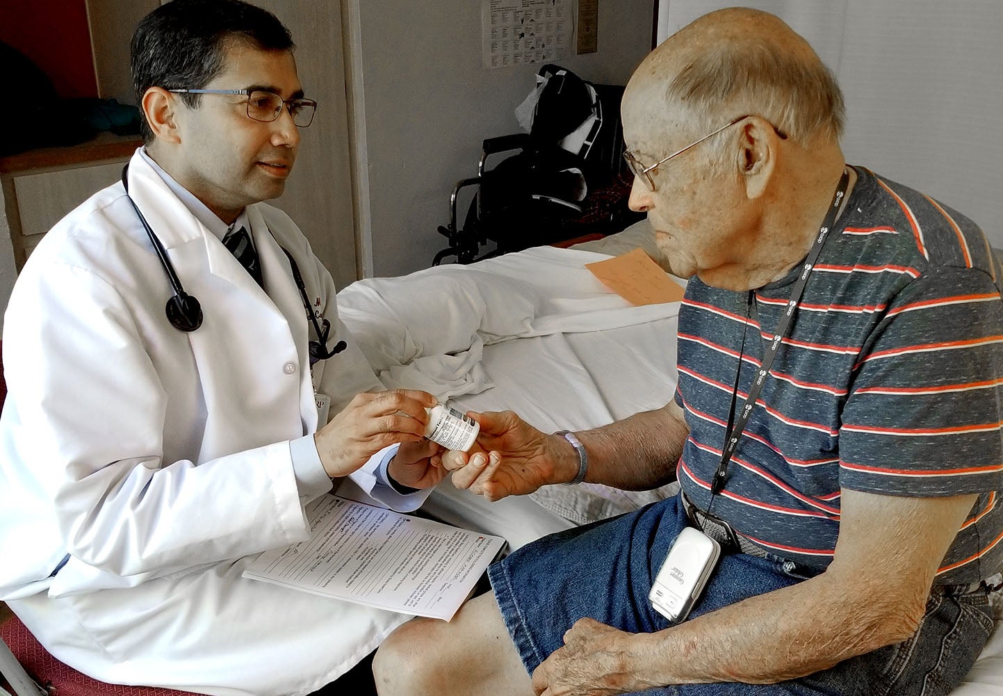 Dr. Parag Agnihotri with patient is Richard Maringer at Sharp Rees-Stealy Medical Group in San Diego.