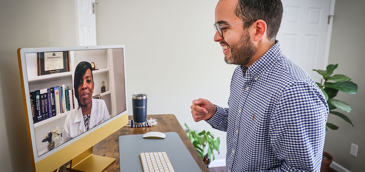 Doctors consult via video conference