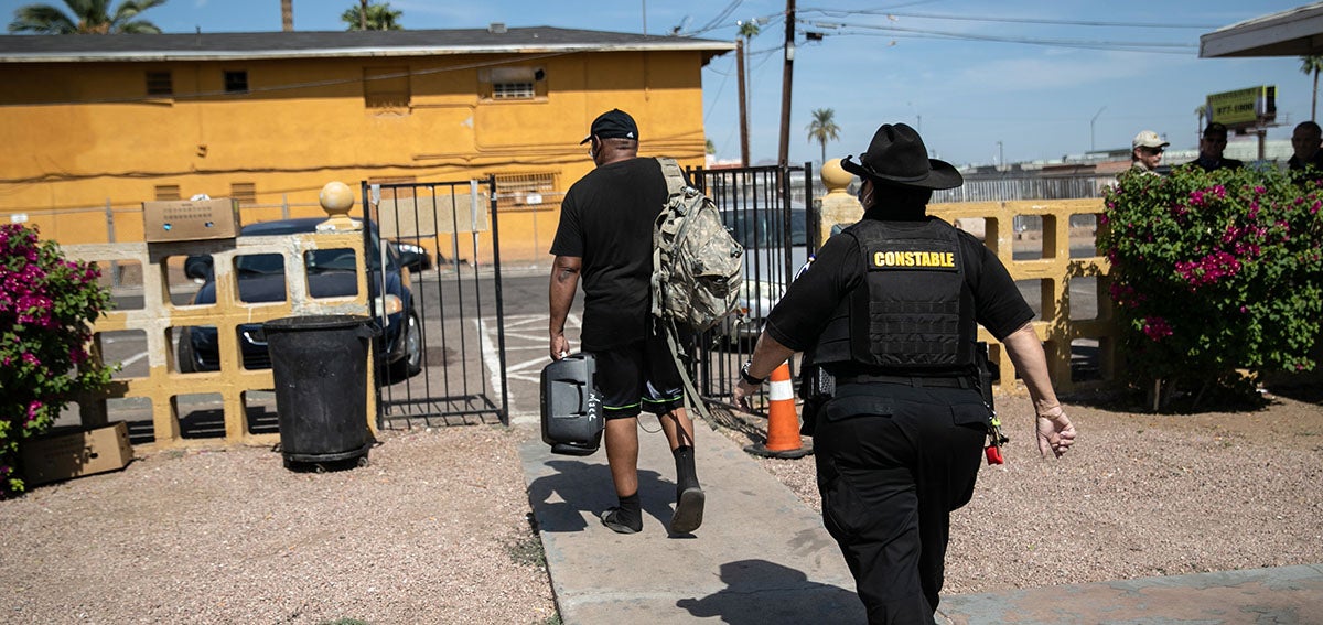 Constable evicts a tenant on October 7, 2020 in Phoenix, Arizona.