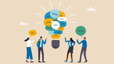 Illustration of a group of people conversing and coming up with a bright idea