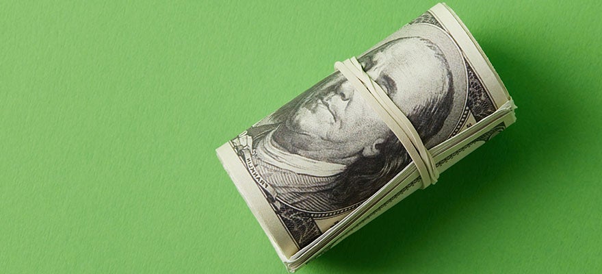 a roll of onehundred dollar bills secured with a rubber band